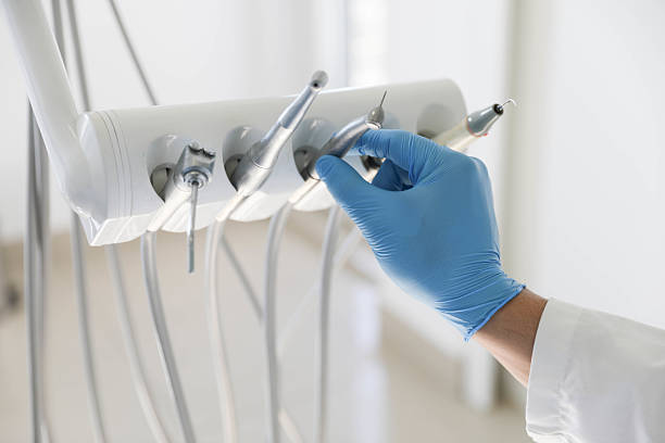 Professional Tooth Extraction technician working in Kingston, TN